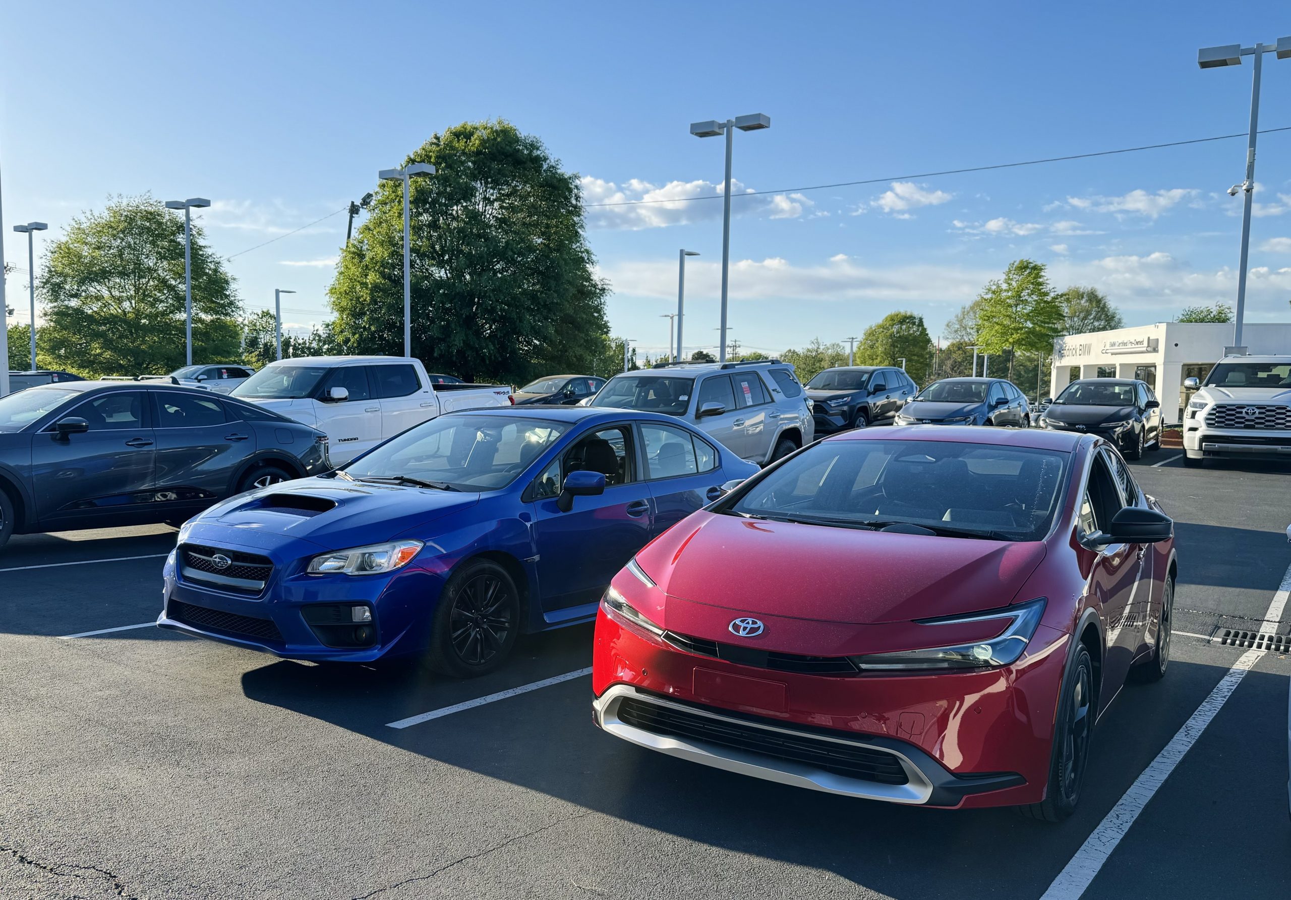 2016 Subaru WRX and 2024 Toyota Prius Prime